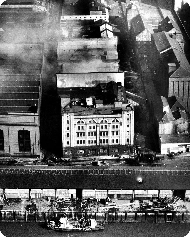 The Fireboat - St Mungo Pumping Water to the Fire Appliances